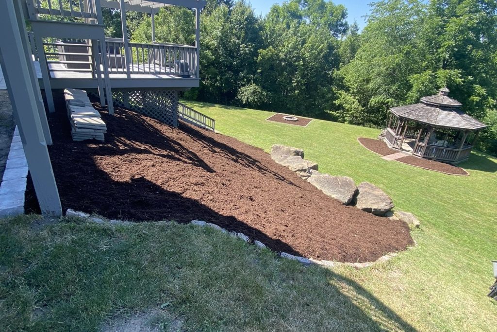 Gazebo in a landscaped back yard with fresh mulch beds and a maintained lawn in Butler County, PA