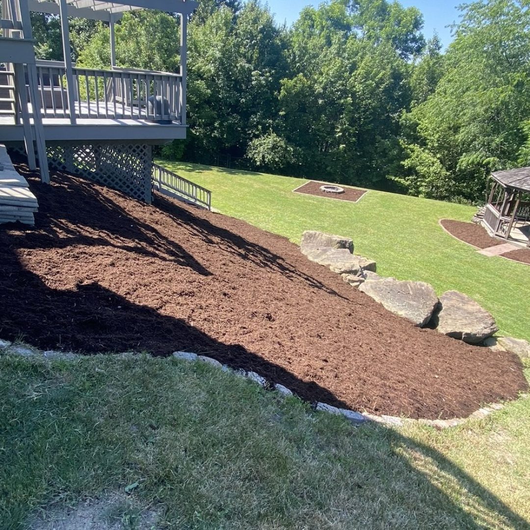 Gazebo in a landscaped back yard with fresh mulch beds and a maintained lawn in Butler County, PA